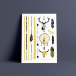 Board of gold and black temporary tattoos "Indian summer" with arrows, feathers and deer heads