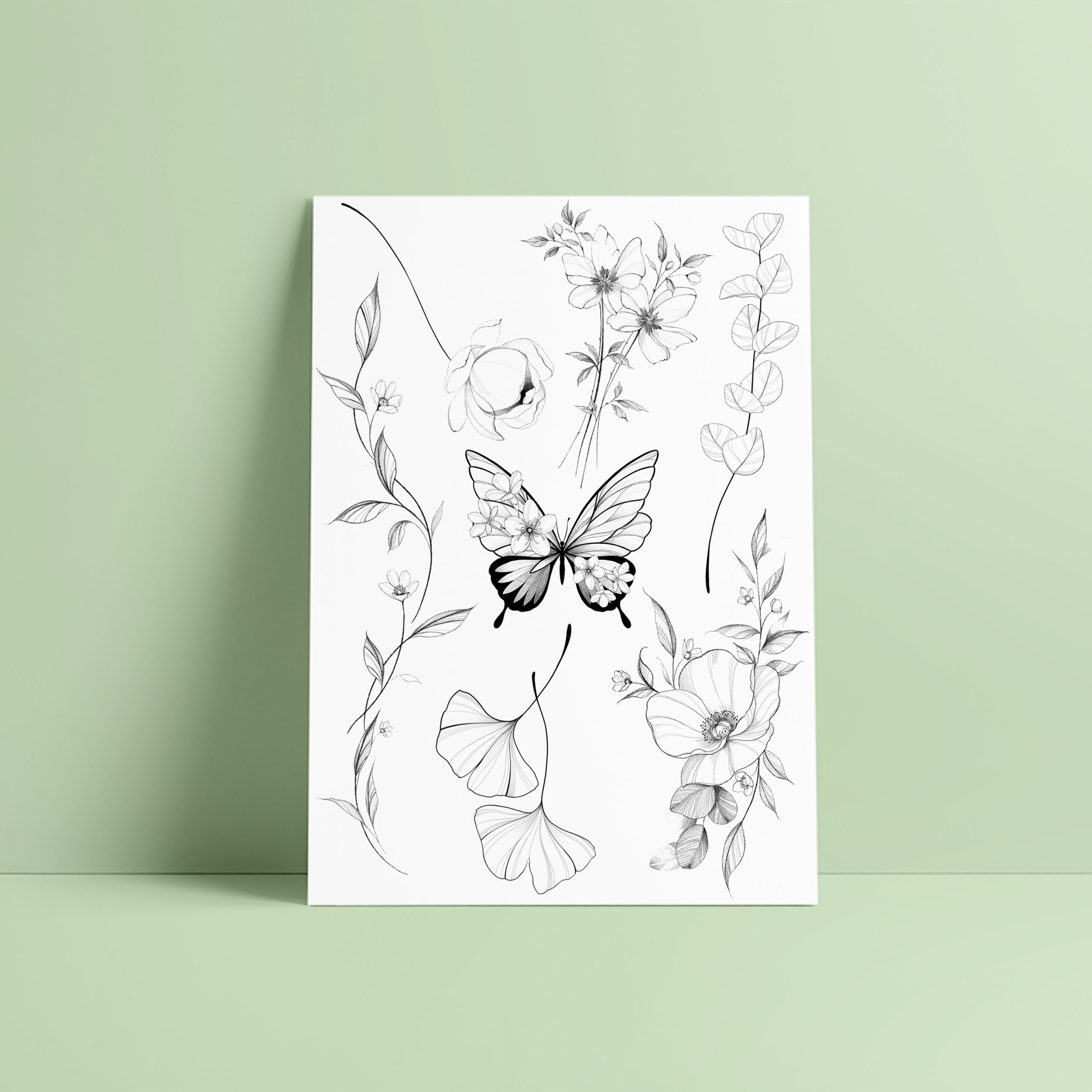 Board of black temporary tattoos with flowers and butterfly