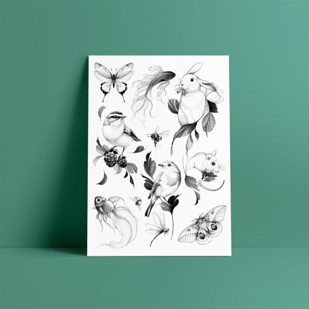 Sheet of temporary tattoos designed by Samantha Dottori featuring small animals such as rabbits, fish, mice and birds.