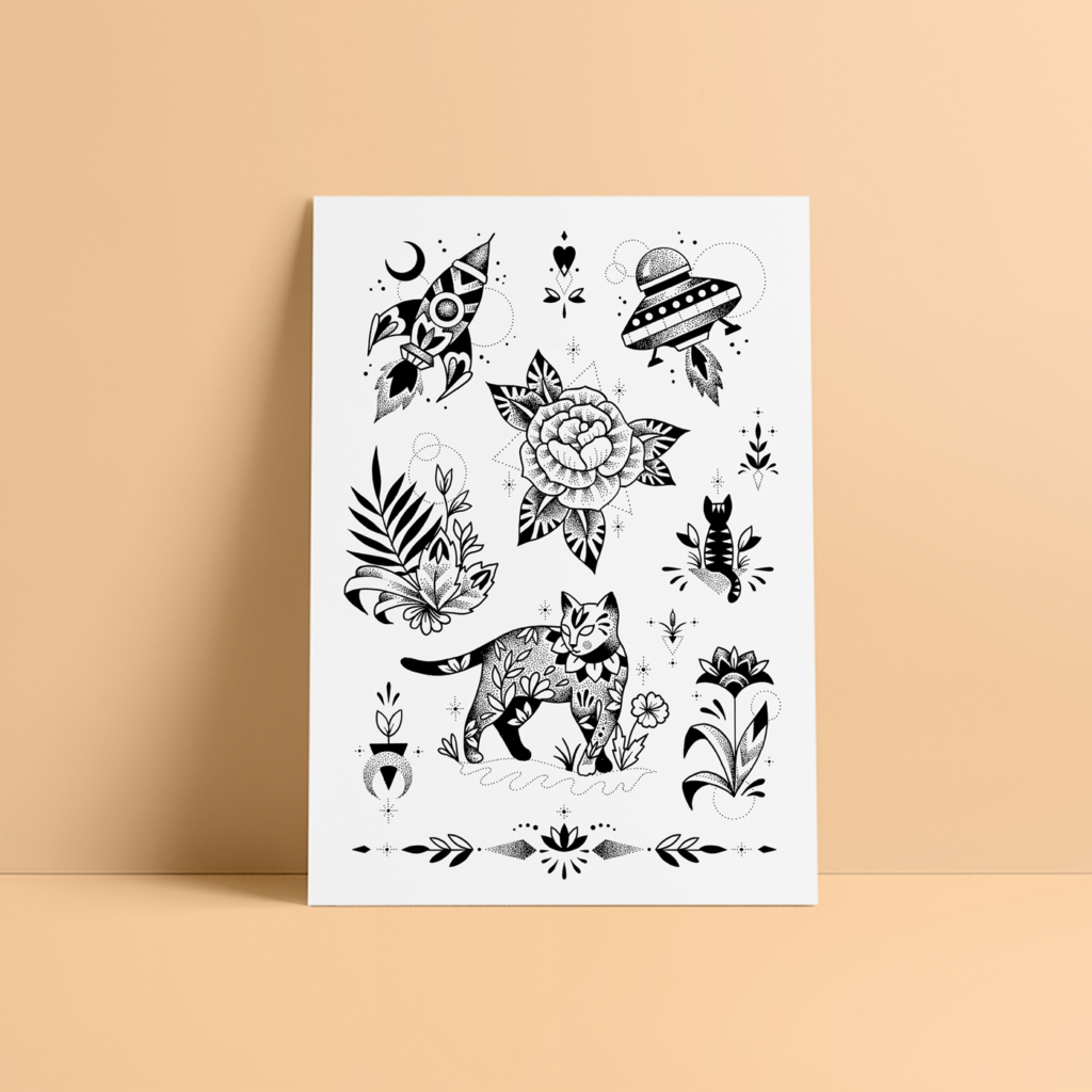 Black "cosmic cat" temporary tattoo sheet with cats, plants, rocket and space shuttle