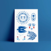 Tatouages éphémères bleus et rouges dessinés par le tatoueur René La Mouise